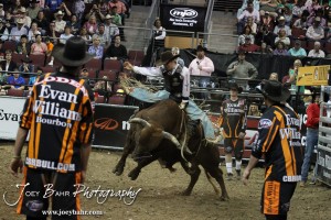 Championship Bull Riding Roto-Mix Dodge City Shootout Aaron Pass rides Ragin JT from Exclusive Genetics/Jaynes Gang & Team Bays during the Championship Round of the Championship Bull Riding Roto-Mix Dodge City Shootout at United Wireless Arena in Dodge City, Kansas on March 17, 2012. Photo: Joey Bahr