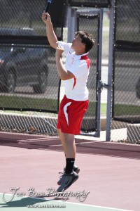 Great Bend Invitiational Boys Tennis Tournament A Hoisington player returns a volley during the Great Bend Invitiational Boys Tennis Tournament at Great Bend High School in Great Bend, Kansas on March 31, 2012. (Photo: Joey Bahr, www.joeybahr.com)