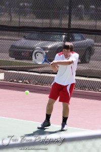 Great Bend Invitiational Boys Tennis Tournament A Hoisington player returns a volley during the Great Bend Invitiational Boys Tennis Tournament at Great Bend High School in Great Bend, Kansas on March 31, 2012. (Photo: Joey Bahr, www.joeybahr.com)