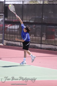Great Bend Invitiational Boys Tennis Tournament An Ellinwood player serves the ball during the Great Bend Invitiational Boys Tennis Tournament at Great Bend High School in Great Bend, Kansas on March 31, 2012. (Photo: Joey Bahr, www.joeybahr.com)