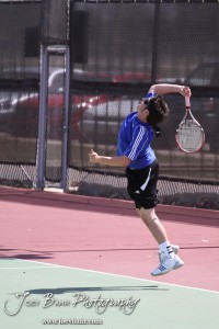 Great Bend Invitiational Boys Tennis Tournament An Ellinwood player serves the ball during the Great Bend Invitiational Boys Tennis Tournament at Great Bend High School in Great Bend, Kansas on March 31, 2012. (Photo: Joey Bahr, www.joeybahr.com)