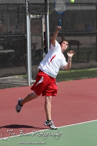 Great Bend Invitiational Boys Tennis Tournament A Hoisington player serves the ball during the Great Bend Invitiational Boys Tennis Tournament at Great Bend High School in Great Bend, Kansas on March 31, 2012. (Photo: Joey Bahr, www.joeybahr.com)