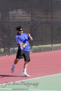 Great Bend Invitiational Boys Tennis Tournament An Ellinwood player returns a volley during the Great Bend Invitiational Boys Tennis Tournament at Great Bend High School in Great Bend, Kansas on March 31, 2012. (Photo: Joey Bahr, www.joeybahr.com)