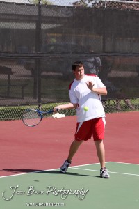 Great Bend Invitiational Boys Tennis Tournament A Hoisington player returns a volley during the Great Bend Invitiational Boys Tennis Tournament at Great Bend High School in Great Bend, Kansas on March 31, 2012. (Photo: Joey Bahr, www.joeybahr.com)