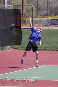 Great Bend Invitiational Boys Tennis Tournament An Ellinwood player serves the ball during the Great Bend Invitiational Boys Tennis Tournament at Great Bend High School in Great Bend, Kansas on March 31, 2012. (Photo: Joey Bahr, www.joeybahr.com)