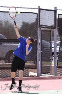 Great Bend Invitiational Boys Tennis Tournament An Ellinwood player serves the ball during the Great Bend Invitiational Boys Tennis Tournament at Great Bend High School in Great Bend, Kansas on March 31, 2012. (Photo: Joey Bahr, www.joeybahr.com)