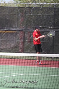 Great Bend Invitiational Boys Tennis Tournament A Great Bend player returns a volley during the Great Bend Invitiational Boys Tennis Tournament at Great Bend High School in Great Bend, Kansas on March 31, 2012. (Photo: Joey Bahr, www.joeybahr.com)