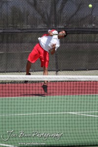 Great Bend Invitiational Boys Tennis Tournament A Hoisington player serves the ball during the Great Bend Invitiational Boys Tennis Tournament at Great Bend High School in Great Bend, Kansas on March 31, 2012. (Photo: Joey Bahr, www.joeybahr.com)