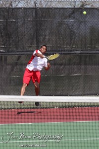 Great Bend Invitiational Boys Tennis Tournament A Hoisington player serves the ball during the Great Bend Invitiational Boys Tennis Tournament at Great Bend High School in Great Bend, Kansas on March 31, 2012. (Photo: Joey Bahr, www.joeybahr.com)