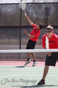 Great Bend Invitiational Boys Tennis Tournament A Great Bend player serves the ball during the Great Bend Invitiational Boys Tennis Tournament at Great Bend High School in Great Bend, Kansas on March 31, 2012. (Photo: Joey Bahr, www.joeybahr.com)