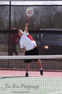Great Bend Invitiational Boys Tennis Tournament A Liberal player serves the ball during the Great Bend Invitiational Boys Tennis Tournament at Great Bend High School in Great Bend, Kansas on March 31, 2012. (Photo: Joey Bahr, www.joeybahr.com)