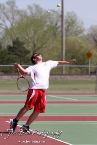 Great Bend Invitiational Boys Tennis Tournament A Hoisington player serves the ball during the Great Bend Invitiational Boys Tennis Tournament at Great Bend High School in Great Bend, Kansas on March 31, 2012. (Photo: Joey Bahr, www.joeybahr.com)