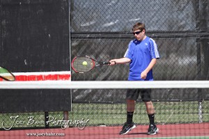 Great Bend Invitiational Boys Tennis Tournament An Ellinwood player returns a volley during the Great Bend Invitiational Boys Tennis Tournament at Great Bend High School in Great Bend, Kansas on March 31, 2012. (Photo: Joey Bahr, www.joeybahr.com)