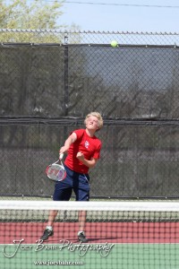 Great Bend Invitiational Boys Tennis Tournament A Dodge City player serves the ball during the Great Bend Invitiational Boys Tennis Tournament at Great Bend High School in Great Bend, Kansas on March 31, 2012. (Photo: Joey Bahr, www.joeybahr.com)