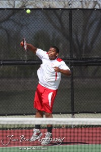 Great Bend Invitiational Boys Tennis Tournament A Hoisington player serves the ball during the Great Bend Invitiational Boys Tennis Tournament at Great Bend High School in Great Bend, Kansas on March 31, 2012. (Photo: Joey Bahr, www.joeybahr.com)