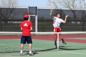 Great Bend Invitiational Boys Tennis Tournament A Hoisington player returns a volley during the Great Bend Invitiational Boys Tennis Tournament at Great Bend High School in Great Bend, Kansas on March 31, 2012. (Photo: Joey Bahr, www.joeybahr.com)