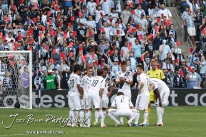 Sporting_KC_vs_LA_Galaxy_4-7-12_0419 The LA Galaxy players huddle up before kicking of the match with Sporting Kansas City at LIVESTRONG Sporting Park in Kansas City, Kansas on April 7, 2012. (Photo: Joey Bahr, www.joeybahr.com)