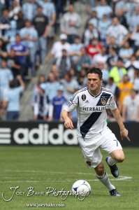 Sporting_KC_vs_LA_Galaxy_4-7-12_0488 LA Galaxy Forward Robbie Keane (#7) brings the ball down the field against Sporting Kansas City at LIVESTRONG Sporting Park in Kansas City, Kansas on April 7, 2012. (Photo: Joey Bahr, www.joeybahr.com)