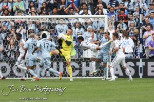 Sporting_KC_vs_LA_Galaxy_4-7-12_0507 LA Galaxy Goal Keeper Josh Saunders (#12) catches the ball during a set piece play against Sporting Kansas City at LIVESTRONG Sporting Park in Kansas City, Kansas on April 7, 2012. (Photo: Joey Bahr, www.joeybahr.com)