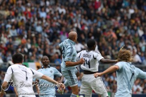 Sporting_KC_vs_LA_Galaxy_4-7-12_0644 Sporting Kansas City Defender Aurelien Collin (#78) and LA Galaxy Forward Edson Buddle (#14) go up to head a ball at LIVESTRONG Sporting Park in Kansas City, Kansas on April 7, 2012. (Photo: Joey Bahr, www.joeybahr.com)
