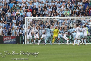 Sporting_KC_vs_LA_Galaxy_4-7-12_0678 Sporting Kansas City and LA Galaxy players jockey for position during a corner kick at LIVESTRONG Sporting Park in Kansas City, Kansas on April 7, 2012. (Photo: Joey Bahr, www.joeybahr.com)