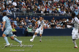 Sporting_KC_vs_LA_Galaxy_4-7-12_0749 LA Galaxy Midfielder Landon Donovan (#10) looks for a teammate to pass the ball to against Sporting Kansas City at LIVESTRONG Sporting Park in Kansas City, Kansas on April 7, 2012. (Photo: Joey Bahr, www.joeybahr.com)