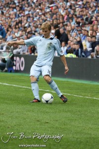 Sporting_KC_vs_LA_Galaxy_4-7-12_0852 Sporting Kansas City Defender Seth Sinovic (#16) kicks the ball against LA Galaxy at LIVESTRONG Sporting Park in Kansas City, Kansas on April 7, 2012. (Photo: Joey Bahr, www.joeybahr.com)