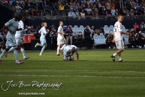Sporting_KC_vs_LA_Galaxy_4-7-12_0913 Sporting Kansas City Midfielder Graham Zusi (#8) reacts after being hit in the face against LA Galaxy at LIVESTRONG Sporting Park in Kansas City, Kansas on April 7, 2012. (Photo: Joey Bahr, www.joeybahr.com)