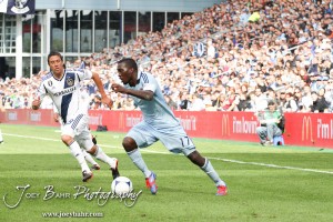 Sporting_KC_vs_LA_Galaxy_4-7-12_0933 Sporting Kansas City Forward C.J. Sapong (#17) drives towards the LA Galaxy goal at LIVESTRONG Sporting Park in Kansas City, Kansas on April 7, 2012. (Photo: Joey Bahr, www.joeybahr.com)