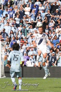 Sporting_KC_vs_LA_Galaxy_4-7-12_0938 LA Galaxy Defender Sean Franklin (#5) heads a goal kick against Sporting Kansas City at LIVESTRONG Sporting Park in Kansas City, Kansas on April 7, 2012. (Photo: Joey Bahr, www.joeybahr.com)