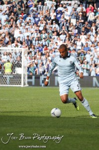Sporting_KC_vs_LA_Galaxy_4-7-12_0987 Sporting Kansas City Forward Teal Bunbury (#9) drives towards the goal against LA Galaxy at LIVESTRONG Sporting Park in Kansas City, Kansas on April 7, 2012. (Photo: Joey Bahr, www.joeybahr.com)