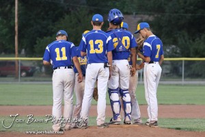 KSHSAA 4A Regional Baseball Championship The Nickerson Panthers meet at the mound for a strategy discussion in their game against the Colby Eagles at the KSHSAA 4A Regional Baseball Championship at Legion Field in Hoisington, Kansas on May 16, 2012. (Photo: Joey Bahr, www.joeybahr.com)