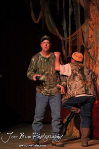 Duwell played by Charlie Dixon sees an angel while Duane played by K.B. Bell looks for a stick during the Great Bend Community Theater's final rehearsal of "Duck Hunter Shoots Angel" by Mitch Albom at Crest Theater in Great Bend, Kansas on April 17, 2013. (Photo: Joey Bahr, www.joeybahr.com)