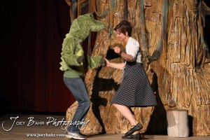 Gator Creature/Phil played by Lynn Benefield and Woman played by Claudia Wyatt dance at the beginning of the Second Act during the Great Bend Community Theater's final rehearsal of "Duck Hunter Shoots Angel" by Mitch Albom at Crest Theater in Great Bend, Kansas on April 17, 2013. (Photo: Joey Bahr, www.joeybahr.com)