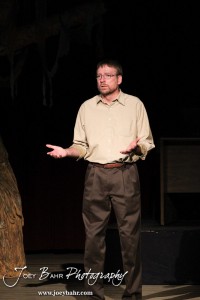 Sandy played by Doug Simmons talks to the Voice/Loan Officer played by John O'Connor during the Great Bend Community Theater's final rehearsal of "Duck Hunter Shoots Angel" by Mitch Albom at Crest Theater in Great Bend, Kansas on April 17, 2013. (Photo: Joey Bahr, www.joeybahr.com)