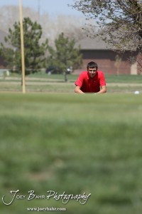 Liberal Redskin Blake Brenneman reads the green during the Great Bend High School Boys Golf Invitational Tournament at The Club at Stoneridge in Great Bend, Kansas on April 29, 2013. (Photo: Joey Bahr, www.joeybahr.com)