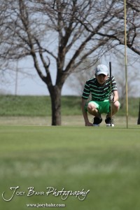 Salina South Cougar Tim Kroeker reads the green during the Great Bend High School Boys Golf Invitational Tournament at The Club at Stoneridge in Great Bend, Kansas on April 29, 2013. (Photo: Joey Bahr, www.joeybahr.com)
