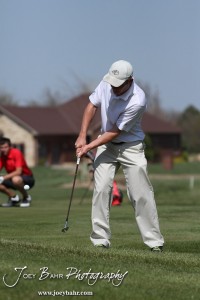 Garden City Buffalo Lucas Goss chips during the Great Bend High School Boys Golf Invitational Tournament at The Club at Stoneridge in Great Bend, Kansas on April 29, 2013. (Photo: Joey Bahr, www.joeybahr.com)