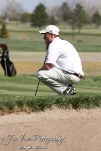 Garden City Buffalo Lucas Goss watches the others putt during the Great Bend High School Boys Golf Invitational Tournament at The Club at Stoneridge in Great Bend, Kansas on April 29, 2013. (Photo: Joey Bahr, www.joeybahr.com)