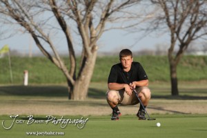 Great Bend Panther Tanner Neeland reads the green during the Great Bend High School Boys Golf Invitational Tournament at The Club at Stoneridge in Great Bend, Kansas on April 29, 2013. (Photo: Joey Bahr, www.joeybahr.com)