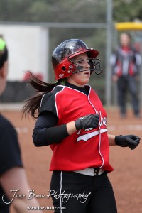 Great Bend Lady Panther Kaylie Doll (#20) runs to First Base during the Liberal Lady Redskins at Great Bend Lady Panthers Softball Double Header with Great Bend winning both games 18-0 (3 innings) 13-0 at Barton Community College Softball Field in Great Bend, Kansas on April 27, 2013. (Photo: Joey Bahr, www.joeybahr.com)