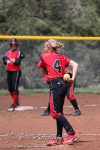 Liberal Lady Redskin Pitcher Brittany Granger (#4) begins her wind up during the Liberal Lady Redskins at Great Bend Lady Panthers Softball Double Header with Great Bend winning both games 18-0 (3 innings) 13-0 at Barton Community College Softball Field in Great Bend, Kansas on April 27, 2013. (Photo: Joey Bahr, www.joeybahr.com)