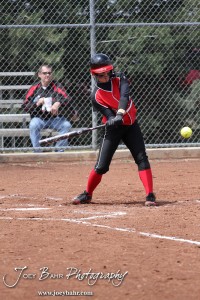 A Great Bend Lady Panther swings at a pitch during the Liberal Lady Redskins at Great Bend Lady Panthers Softball Double Header with Great Bend winning both games 18-0 (3 innings) 13-0 at Barton Community College Softball Field in Great Bend, Kansas on April 27, 2013. (Photo: Joey Bahr, www.joeybahr.com)