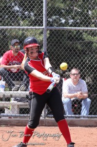 A Great Bend Lady Panther hits the ball during the Liberal Lady Redskins at Great Bend Lady Panthers Softball Double Header with Great Bend winning both games 18-0 (3 innings) 13-0 at Barton Community College Softball Field in Great Bend, Kansas on April 27, 2013. (Photo: Joey Bahr, www.joeybahr.com)