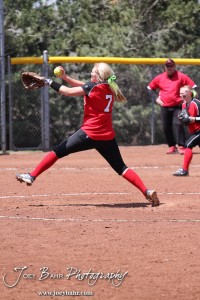 Great Bend Lady Panther Braylin Bretz winds up to deliver a pitch during the Liberal Lady Redskins at Great Bend Lady Panthers Softball Double Header with Great Bend winning both games 18-0 (3 innings) 13-0 at Barton Community College Softball Field in Great Bend, Kansas on April 27, 2013. (Photo: Joey Bahr, www.joeybahr.com)