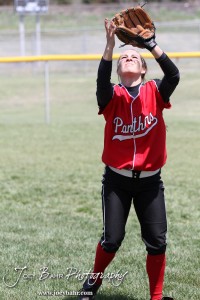 A Great Bend Lady Panther gets under a ball to catch it during the Liberal Lady Redskins at Great Bend Lady Panthers Softball Double Header with Great Bend winning both games 18-0 (3 innings) 13-0 at Barton Community College Softball Field in Great Bend, Kansas on April 27, 2013. (Photo: Joey Bahr, www.joeybahr.com)