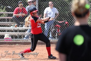 A Great Bend Lady Panther swings at a pitch during the Liberal Lady Redskins at Great Bend Lady Panthers Softball Double Header with Great Bend winning both games 18-0 (3 innings) 13-0 at Barton Community College Softball Field in Great Bend, Kansas on April 27, 2013. (Photo: Joey Bahr, www.joeybahr.com)