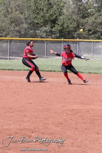 Great Bend Lady Panther Stephanie Morrison (#2) is caught in a rundown during the Liberal Lady Redskins at Great Bend Lady Panthers Softball Double Header with Great Bend winning both games 18-0 (3 innings) 13-0 at Barton Community College Softball Field in Great Bend, Kansas on April 27, 2013. (Photo: Joey Bahr, www.joeybahr.com)