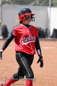 A Great Bend Lady Panther runs to First during the Liberal Lady Redskins at Great Bend Lady Panthers Softball Double Header with Great Bend winning both games 18-0 (3 innings) 13-0 at Barton Community College Softball Field in Great Bend, Kansas on April 27, 2013. (Photo: Joey Bahr, www.joeybahr.com)