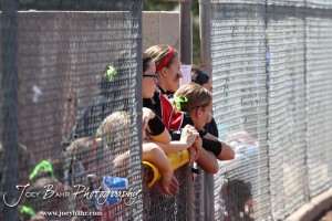 Members of the Great Bend Lady Panthers watch from the dugout during the Liberal Lady Redskins at Great Bend Lady Panthers Softball Double Header with Great Bend winning both games 18-0 (3 innings) 13-0 at Barton Community College Softball Field in Great Bend, Kansas on April 27, 2013. (Photo: Joey Bahr, www.joeybahr.com)